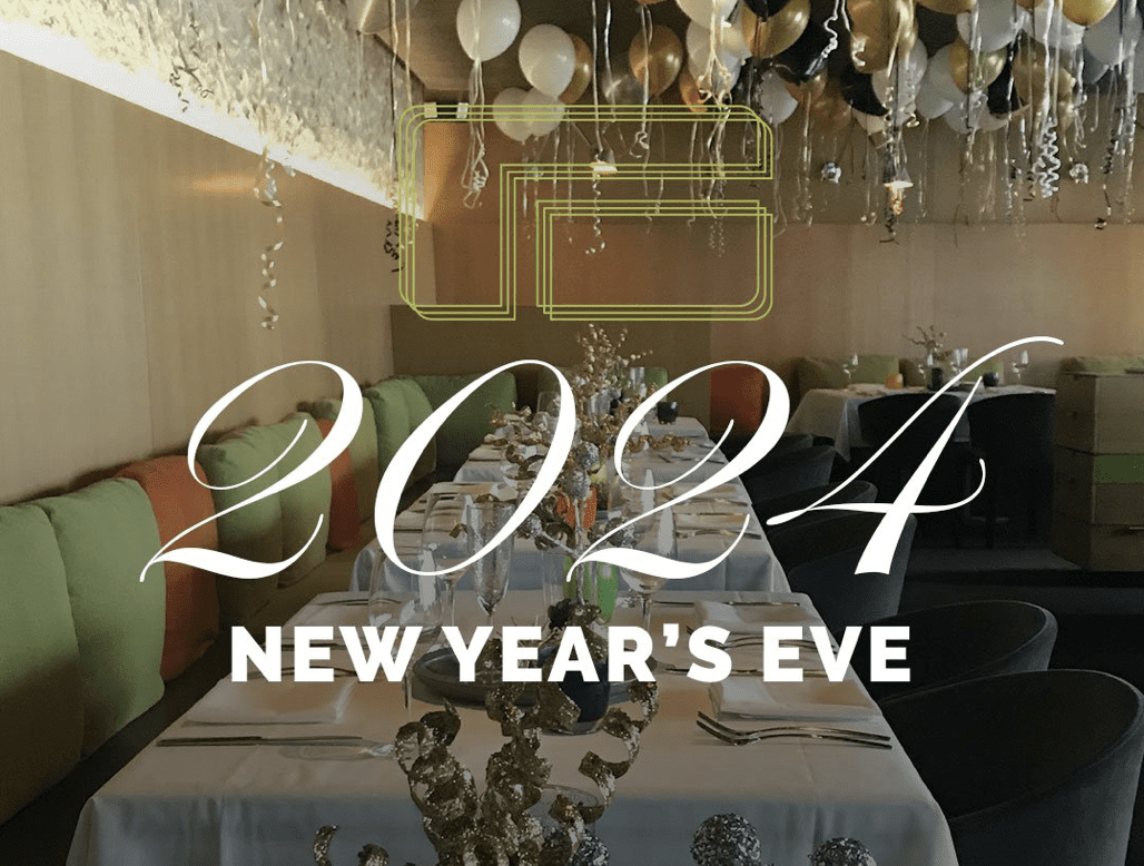 Restaurant dining room with 2024 New Year's Eve written on it.